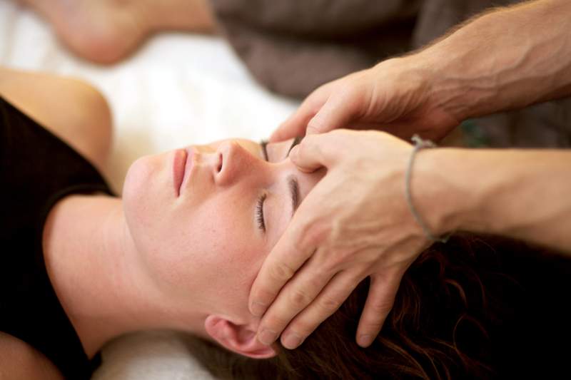 Demonstration of Thai massage working on the belly