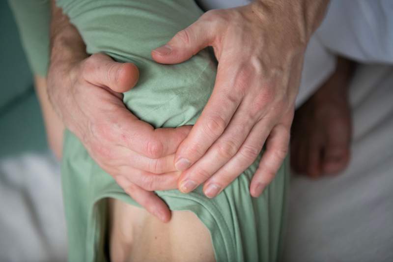 Demonstration of Thai massage working on the belly