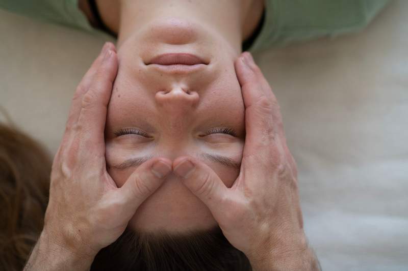 Demonstration of Thai massage working on the belly