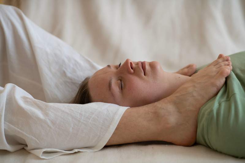 Demonstration of Thai massage working on the belly